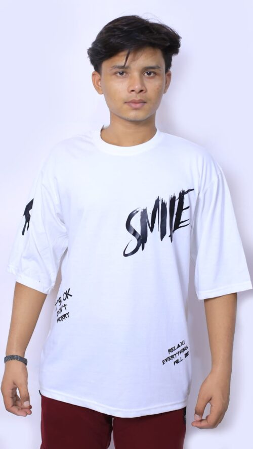 ✅ Smile Printed T-Shirt (White): "Men's white T-shirt featuring a trendy smile graphic print, made from soft and breathable fabric for a casual and comfortable look."