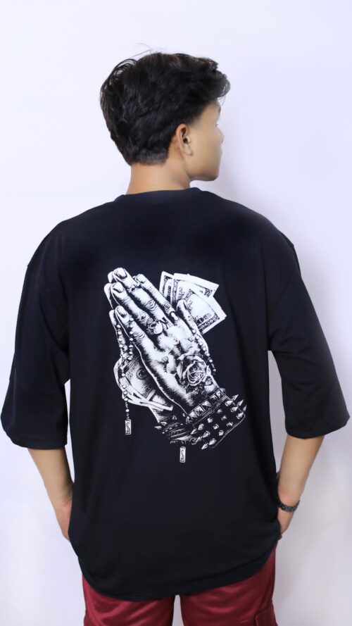 ✅ Money in Hand Printed T-Shirt (Black): "Men's black T-shirt featuring a bold 'Money in Hand' graphic print, crafted from soft and breathable fabric for a trendy and comfortable look."